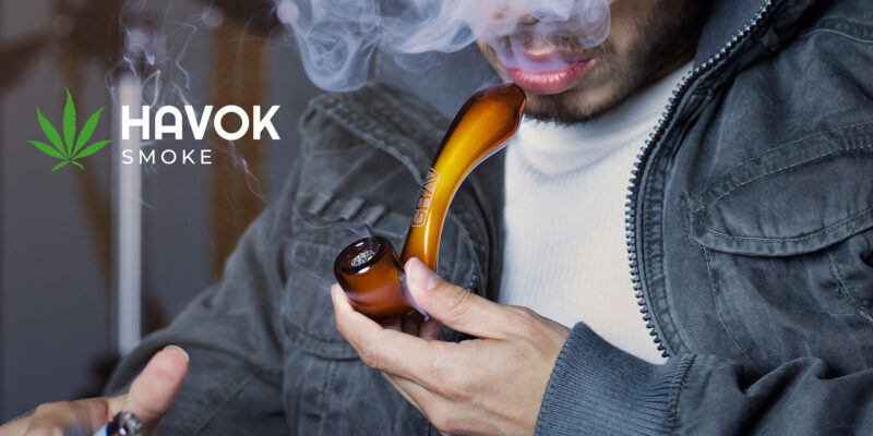 Man holding smoke pipe | Man smoking | Havok Smoke | Cannabis and accessories | Smoke Shop Near Me